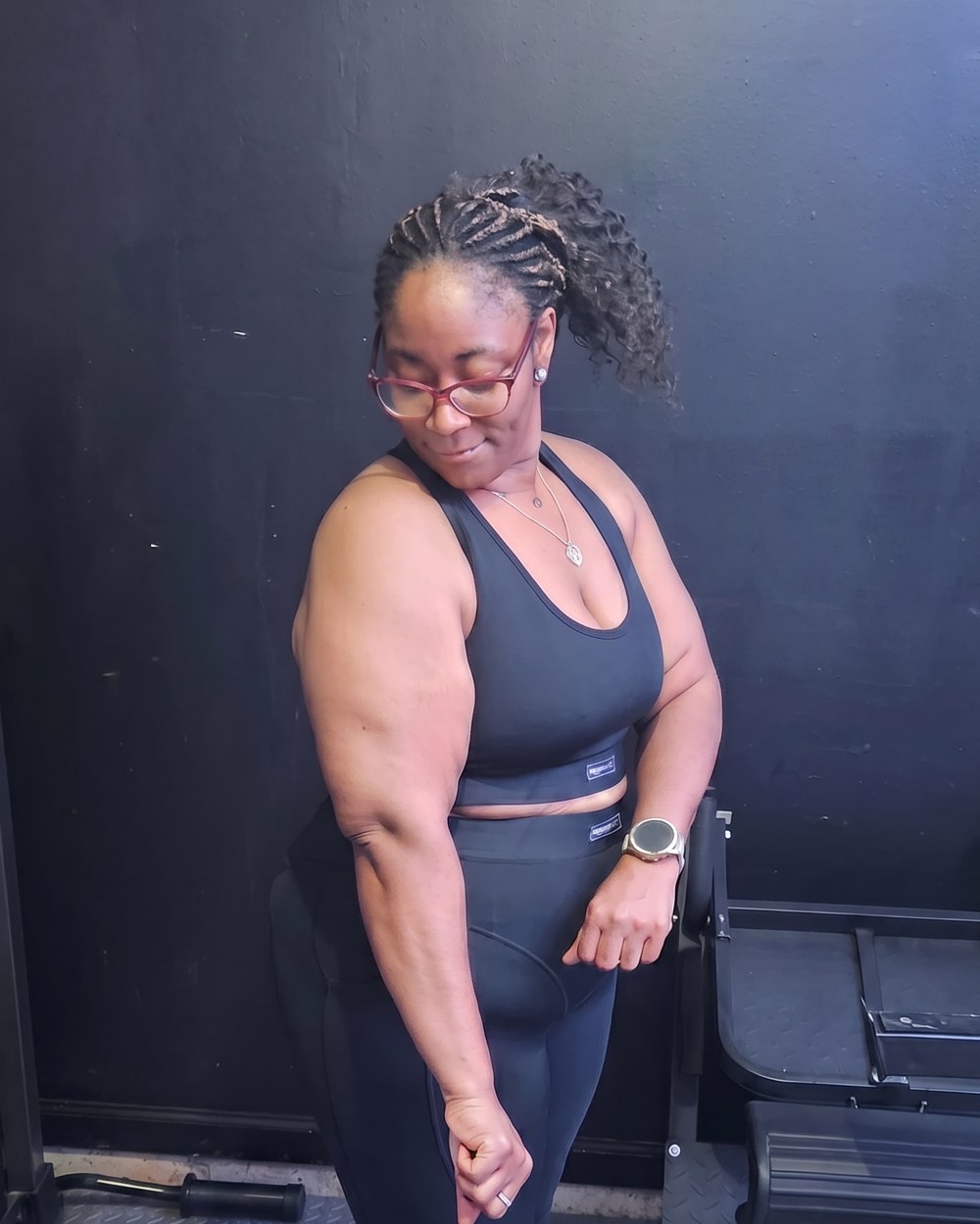 LaShounn Stevenson, BSN, RN, standing confidently in workout gear inside the gym